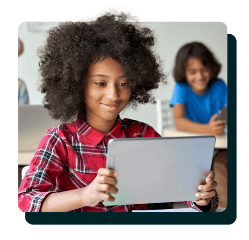 Student smiling with tablet Student smiling with tablet
