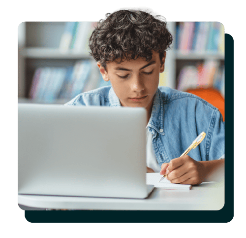 Middle school student at a laptop